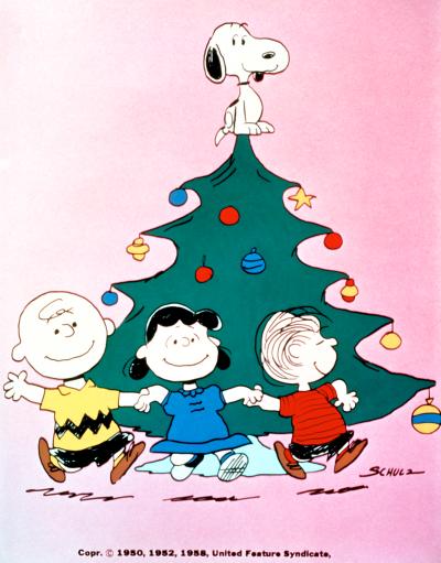 Transforming a simple little tree into a thing of beauty with a lot of love and attention--and some canine star power--are "Peanuts," Snoopy (top) and charlie Brown, Lucy and Linus, in A CHARLIE BROWN CHRISTMAS, Peabody and Emmy Award-winning animated specal to be rebroadcast this holiday season on the CBS Television Network.
